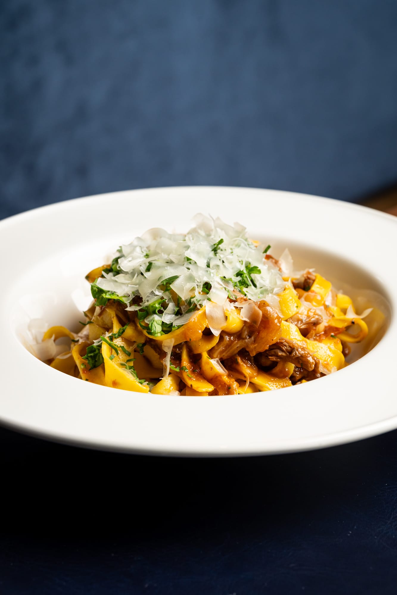 Tagliatelle with ragù and shaved parmigiano